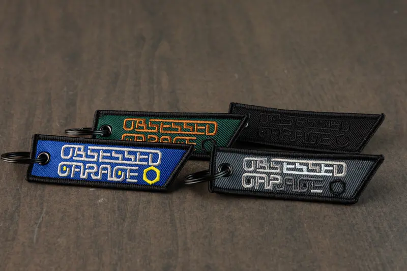 Obsessed Garage Mini Keychain Tag – Durable Aluminum Finish 1